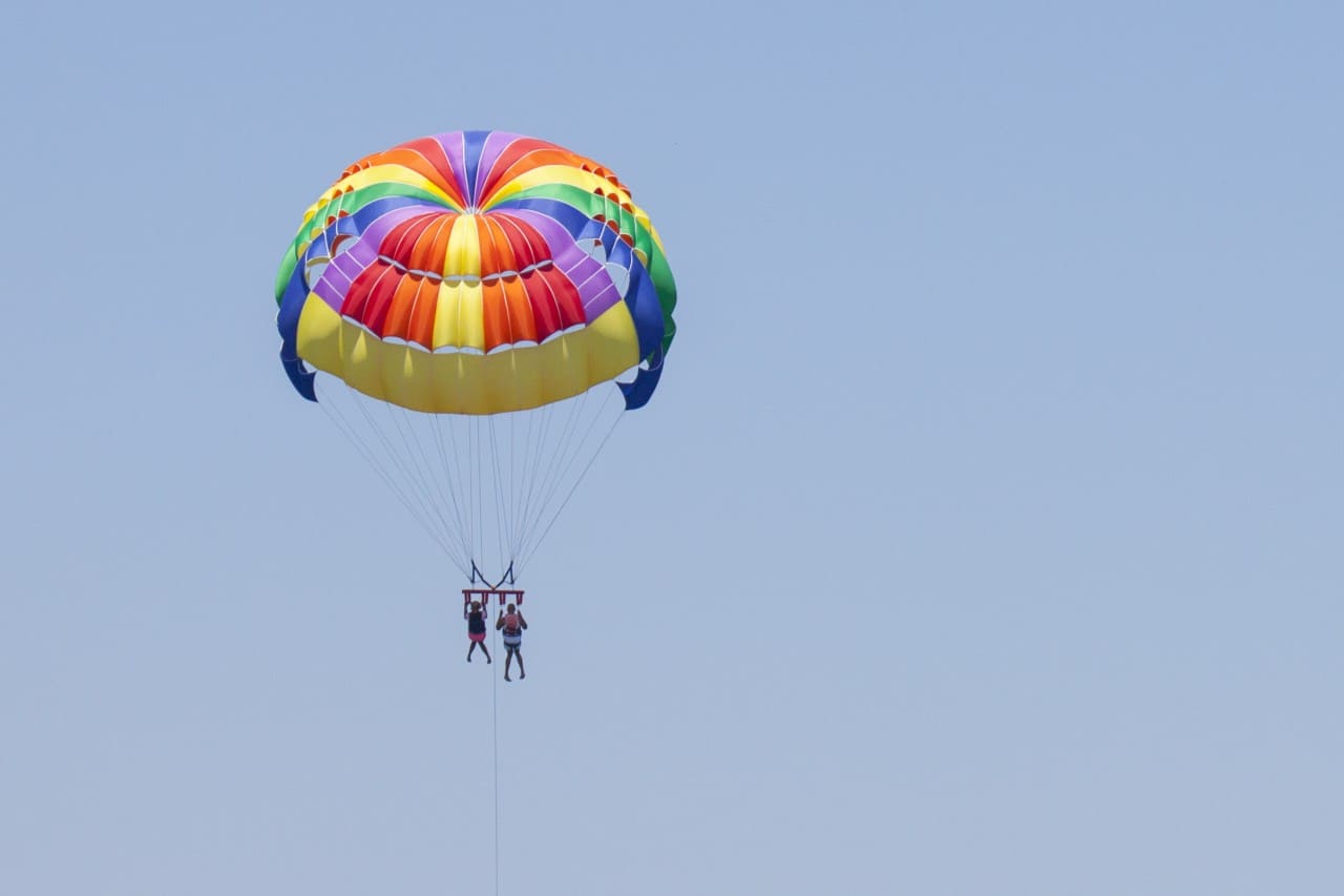 Parasailing - Flight on a parachute behind a boat